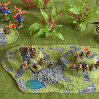 A dwarf army set up on hills